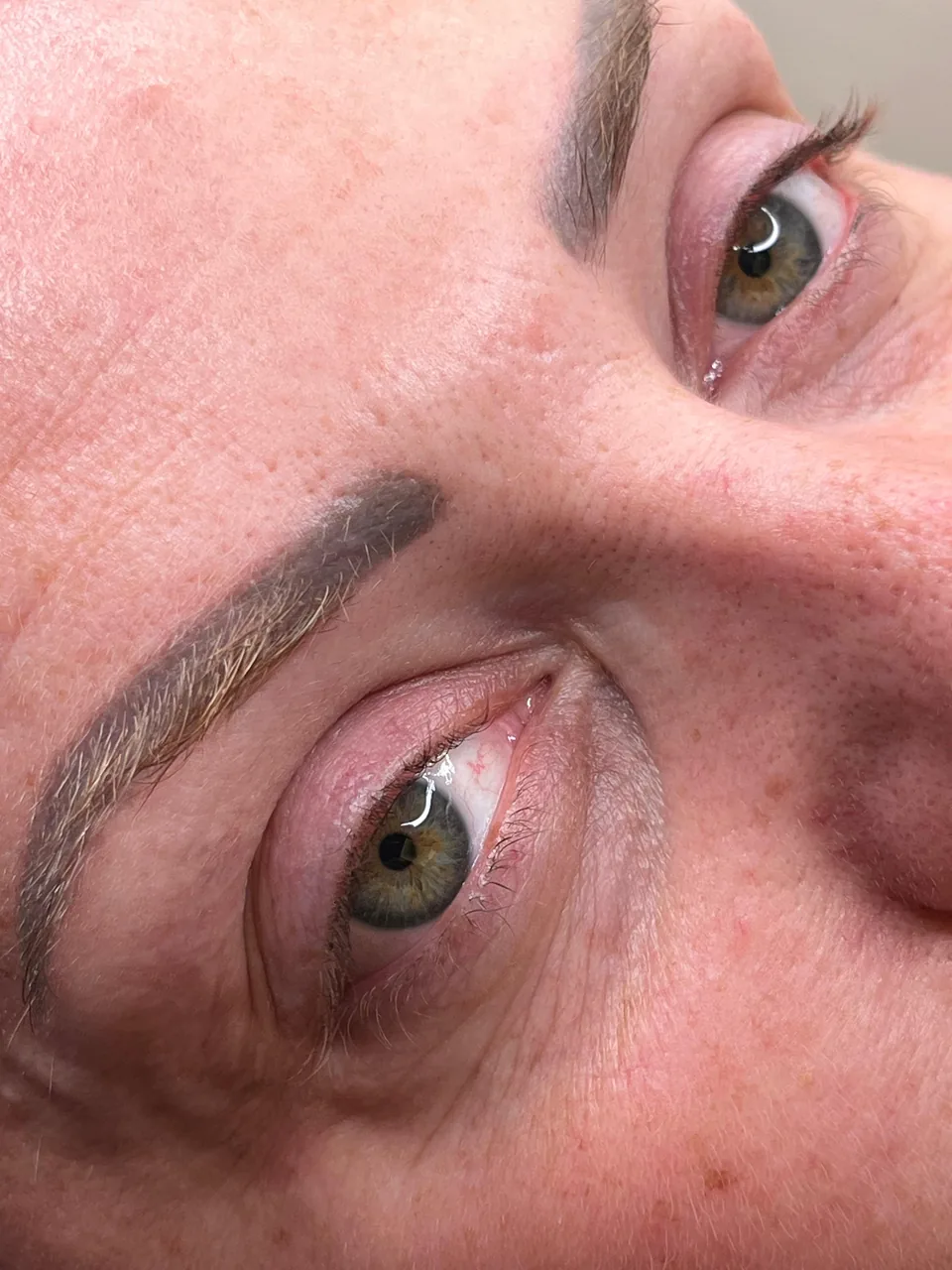 Client portrait with defined brows